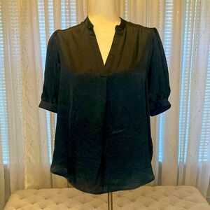 Pleione black v-neck short sleeve silky top.   Size M NWT slight shirt tail hem
